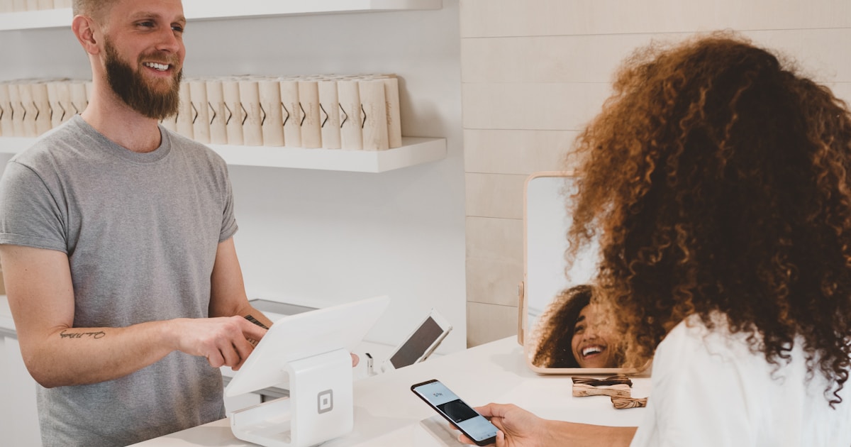 Person using smartphone to purchase instant car insurance with clock showing quick activation time